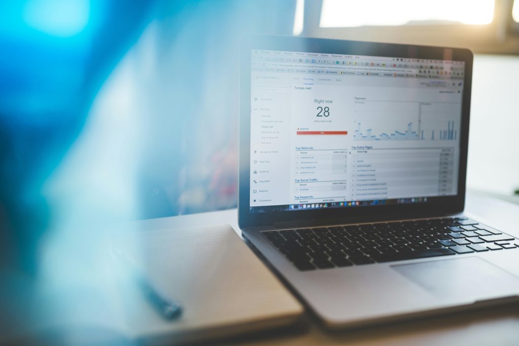 pexels-photo-139387-139387-2 Laptop displaying Google Analytics in a modern workspace, highlighting digital analytics and technology.